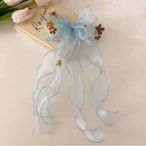 Elegant Sheer Blue Girls Hair Bow with Floral Accents